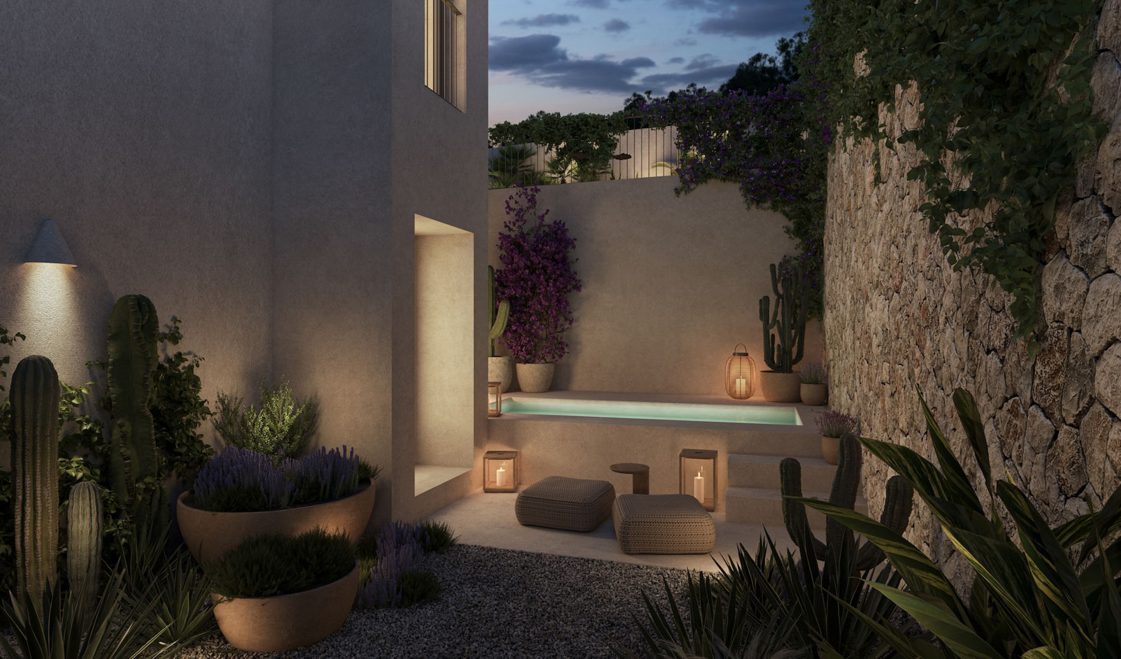 Privater Wellnessbereich im Freien mit Tauchbecken, Natursteinmauern und mediterraner Bepflanzung, stimmungsvoll beleuchtet durch Laternen und Einbaustrahler.