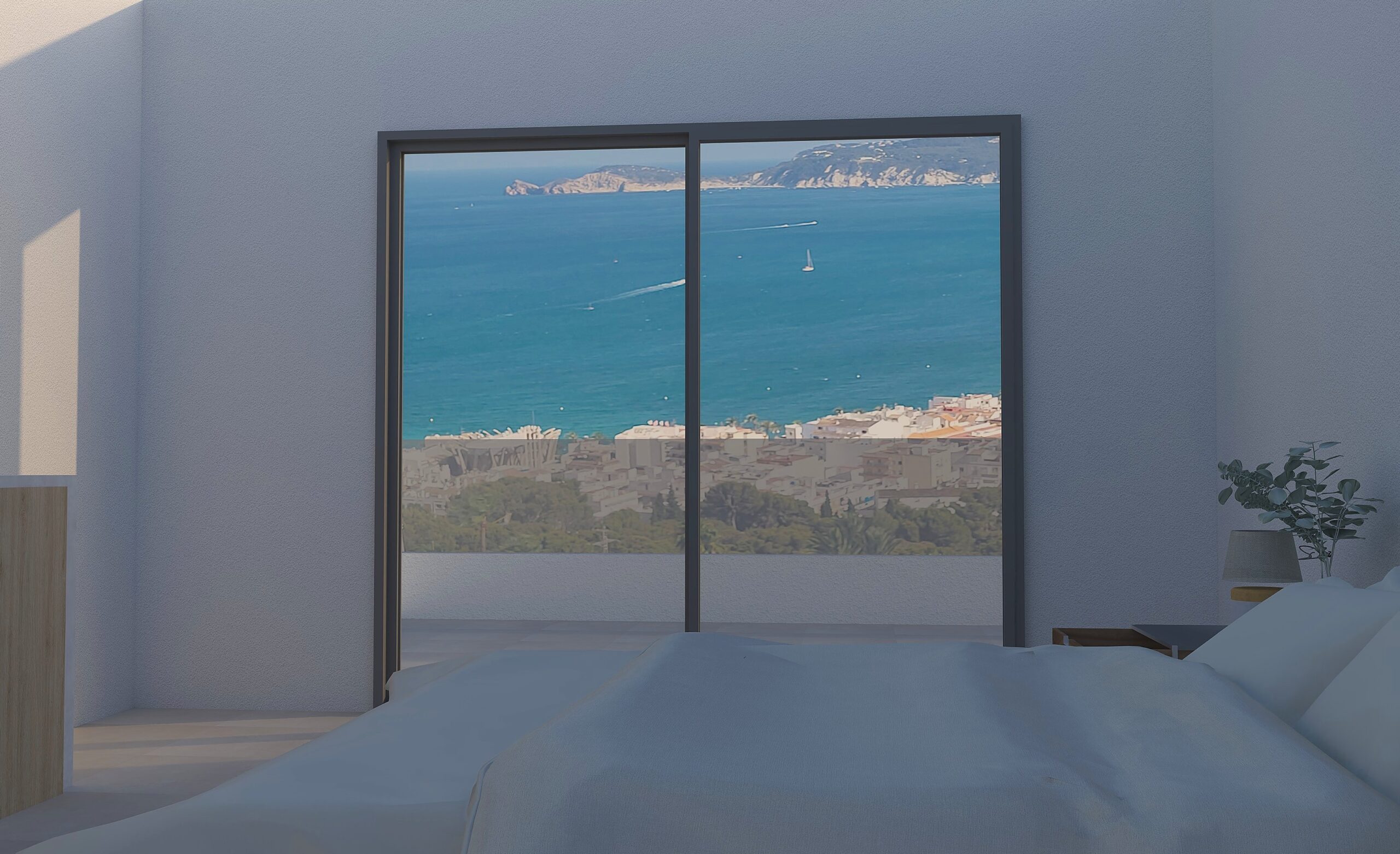 Schlafzimmer mit großen Glasschiebetüren, die einen weiten Panoramablick auf das Mittelmeer und die Küste von Jávea ermöglichen.