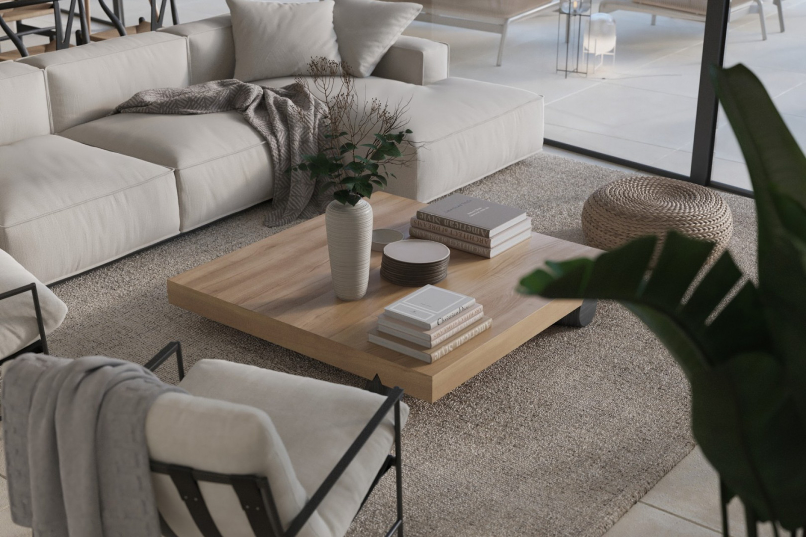 Moderner Wohnbereich mit cremefarbenem Modulsofa, quadratischem Couchtisch aus Eichenholz und großen Glasfronten mit direktem Zugang zur Terrasse.