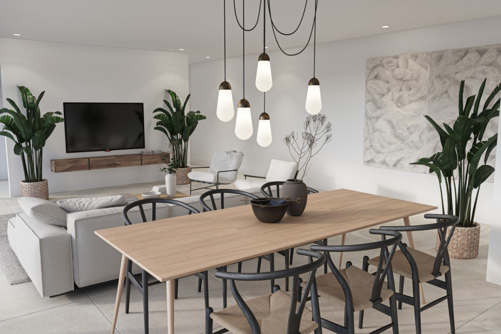 Offener Wohn-Essbereich mit hellem Holztisch, schwarzen Designerstühlen und markanter Pendelleuchte. Das minimalistische Design wird durch natürliche Pflanzen ergänzt.