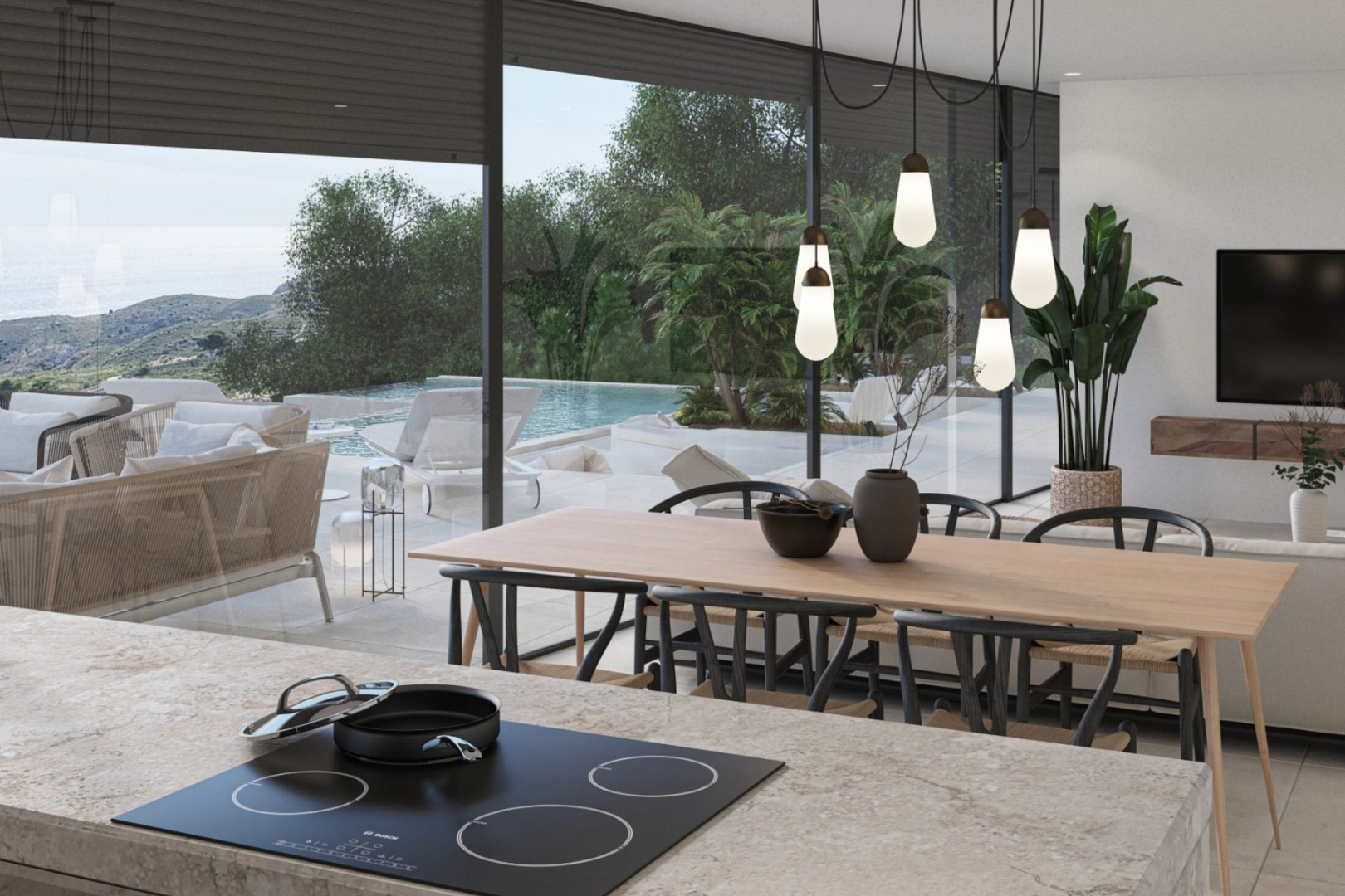 Offener Wohnbereich mit Kücheninsel aus Stein, Designer-Pendelleuchten und bodentiefen Fenstern mit Blick auf den Infinity-Pool und das Mittelmeer.