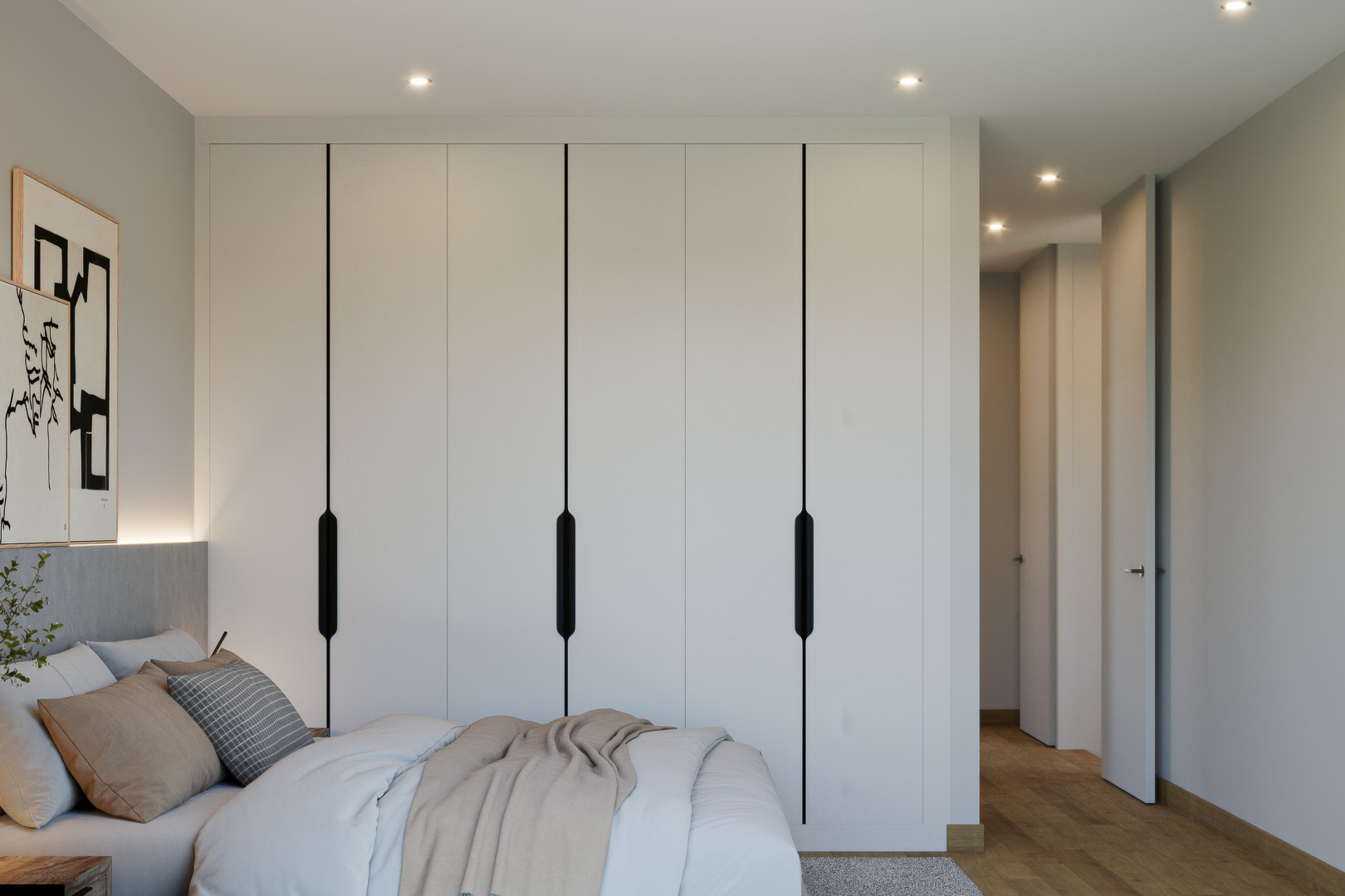 Hauptschlafzimmer mit raumhohen Einbauschränken in Weiß, integrierten schwarzen Griffen, Echtholzparkett und dezenter Deckenbeleuchtung.