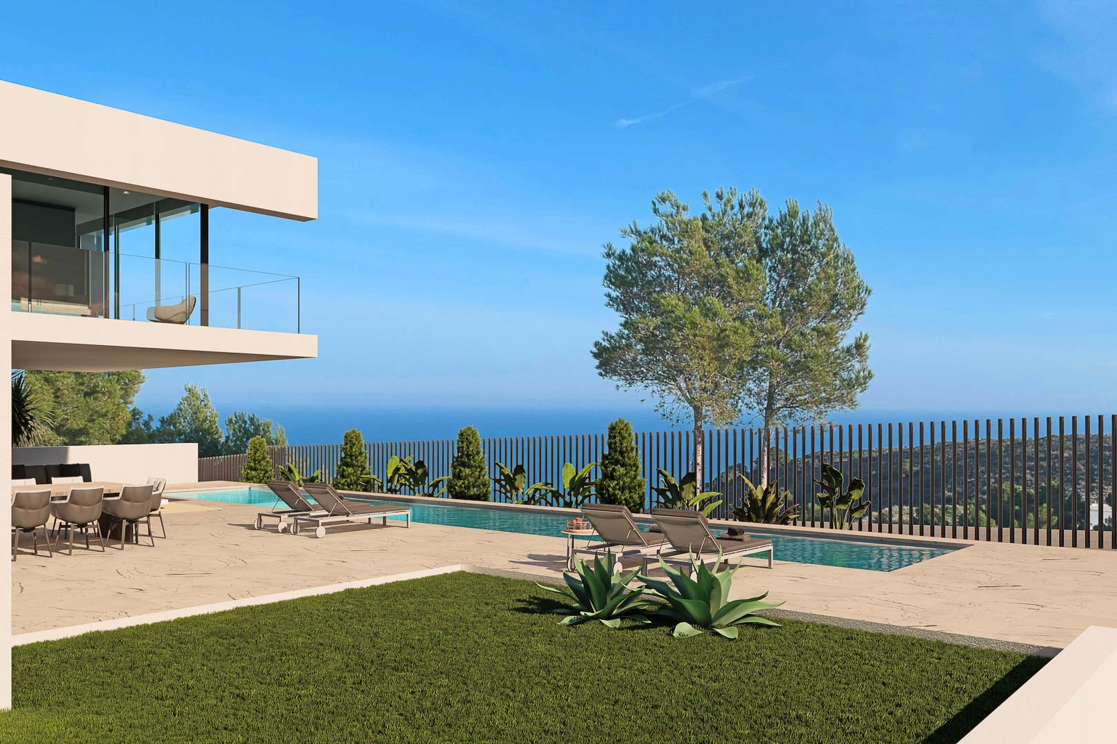 Blick auf den Pool mit Liegestühlen, Garten und Meerblick von der Villa in Moraira.