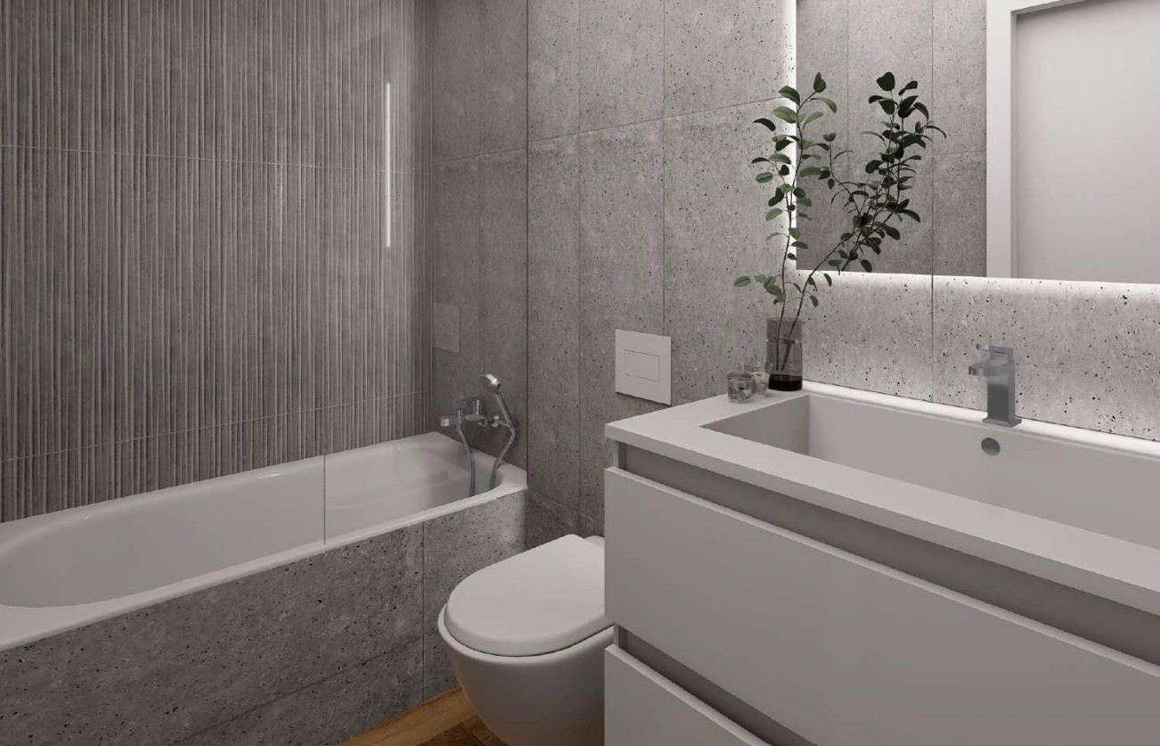 Modernes Badezimmer mit grauen Porcelanosa-Fliesen, Einbaubadewanne mit Glastrennwand und Waschtisch mit LED-hinterleuchtetem Spiegel.