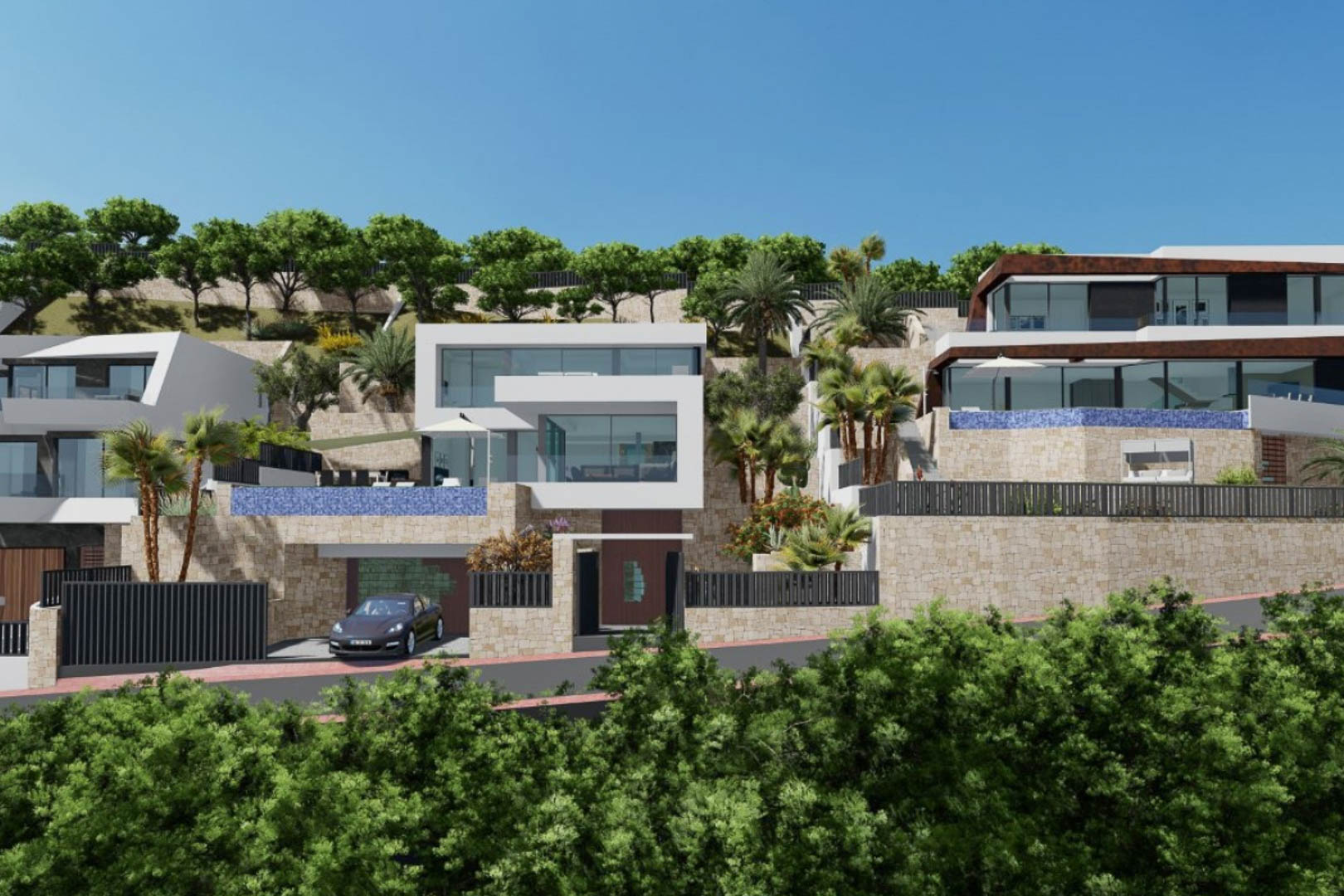 Außenansicht der modernen Villa mit kubischer Architektur, Natursteinmauern, Infinity-Pools mit blauem Mosaik und terrassierten Gärten am Hang.