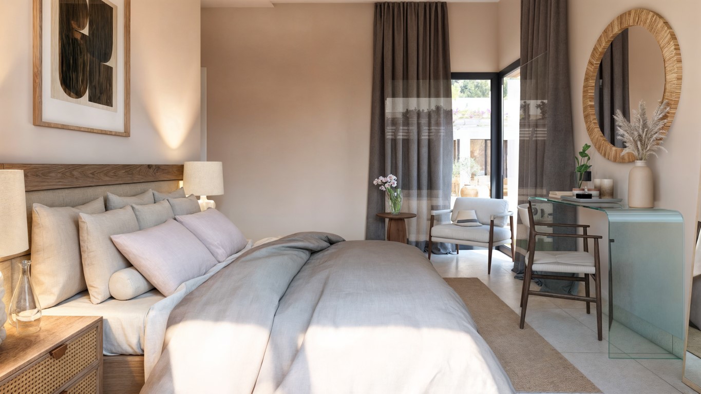 Helles Schlafzimmer mit Kopfteil aus Holz, Glasschreibtisch und direktem Zugang zur Terrasse. Neutrale Farbtöne und zeitgenössisches Design prägen den Raum.