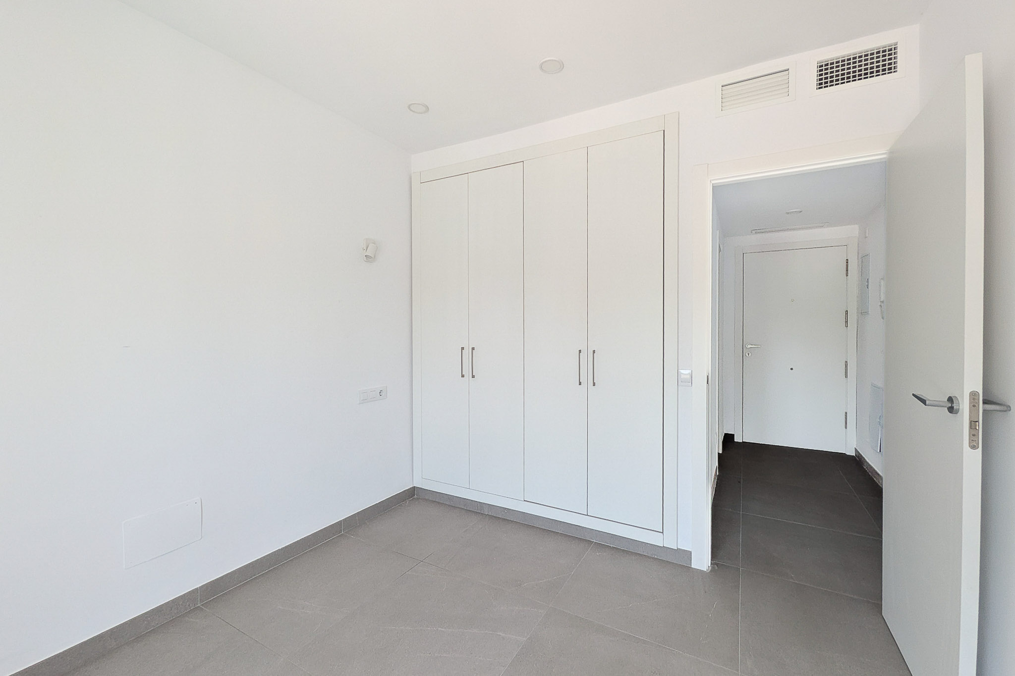 Schlafzimmer mit Einbauschrank