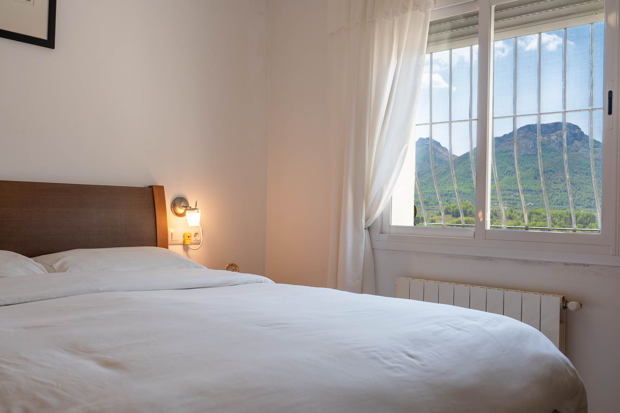 Schlafzimmer mit Bergblick