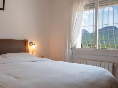 Schlafzimmer mit Bergblick