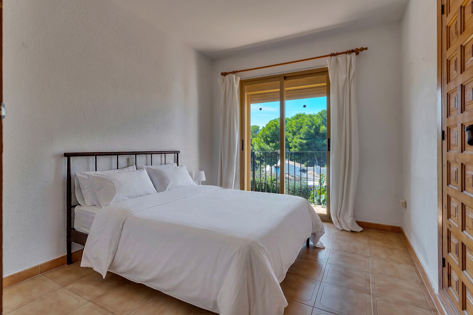 Schlafzimmer mit Balkon