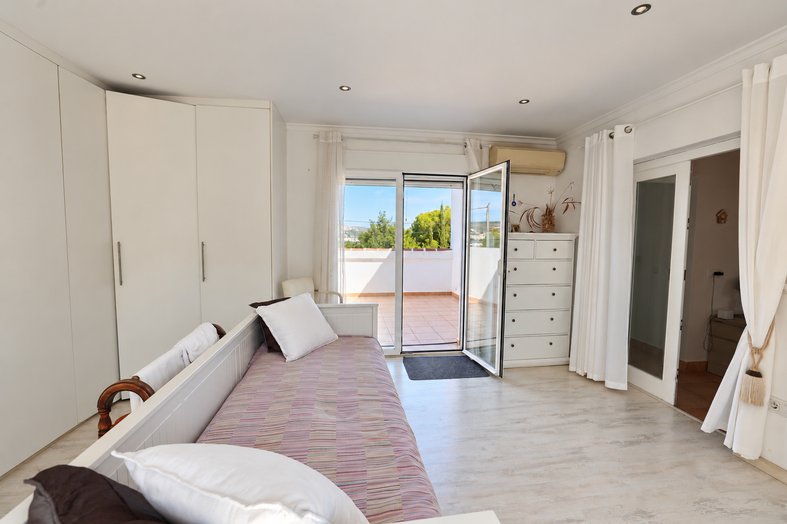 Schlafzimmer mit privater Terrasse