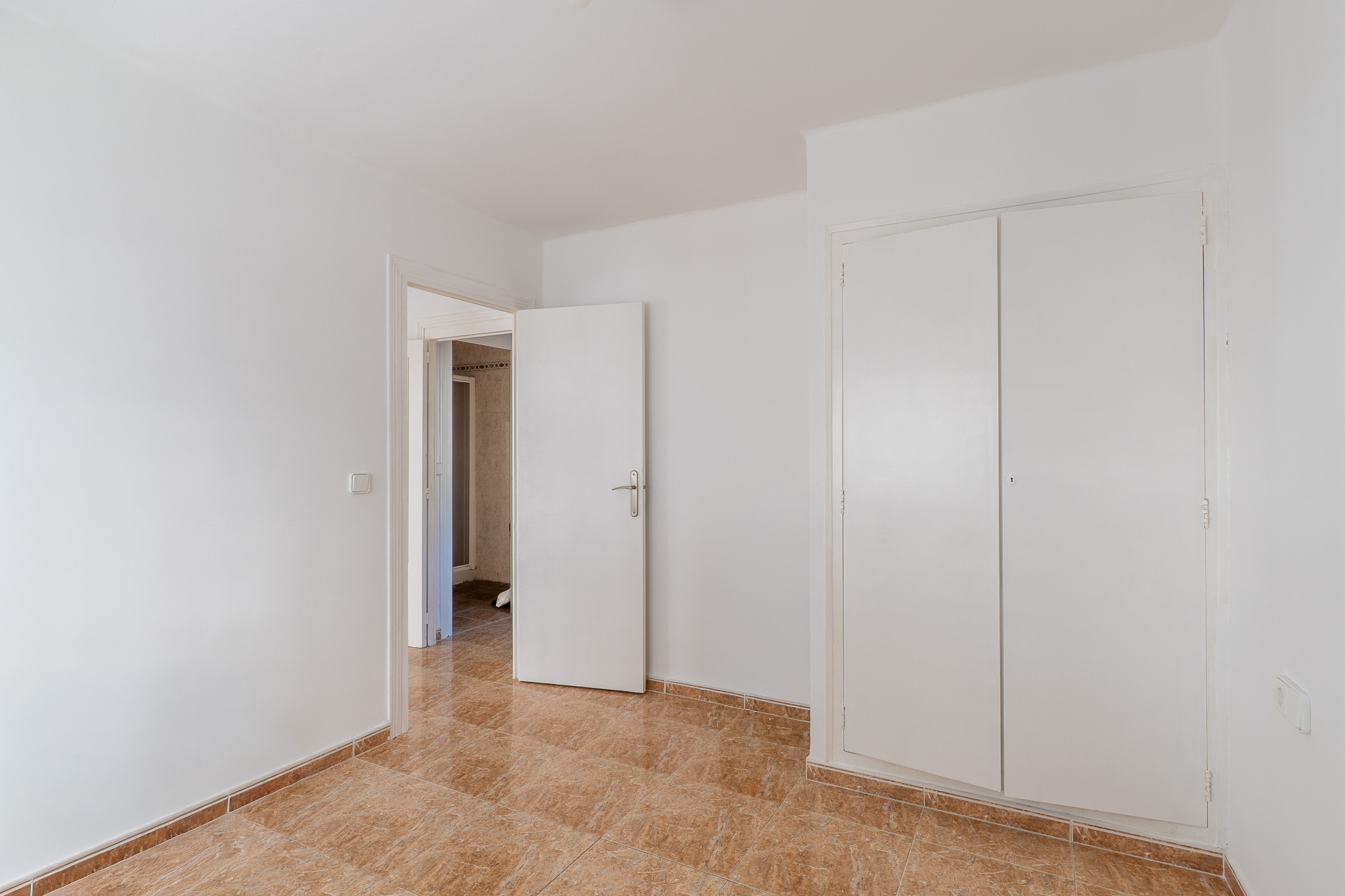 Schlafzimmer mit Einbauschrank