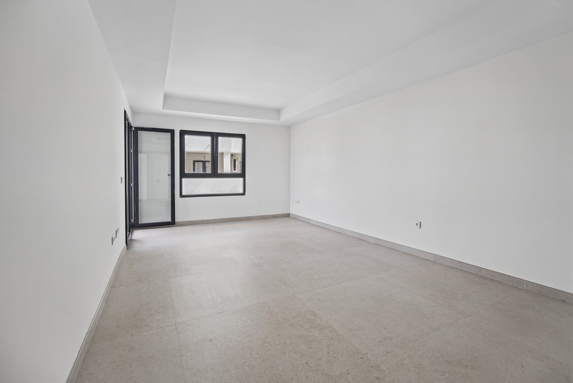 Wohnzimmer mit Zugang zur Terrasse
