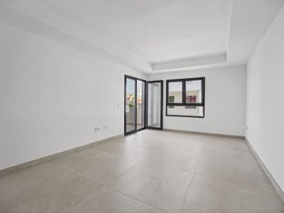 Wohnzimmer mit Zugang zur Terrasse