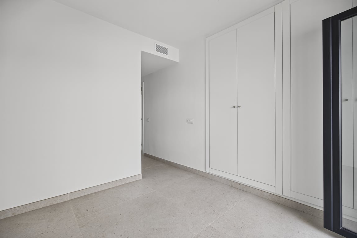 Schlafzimmer mit Einbauschränken