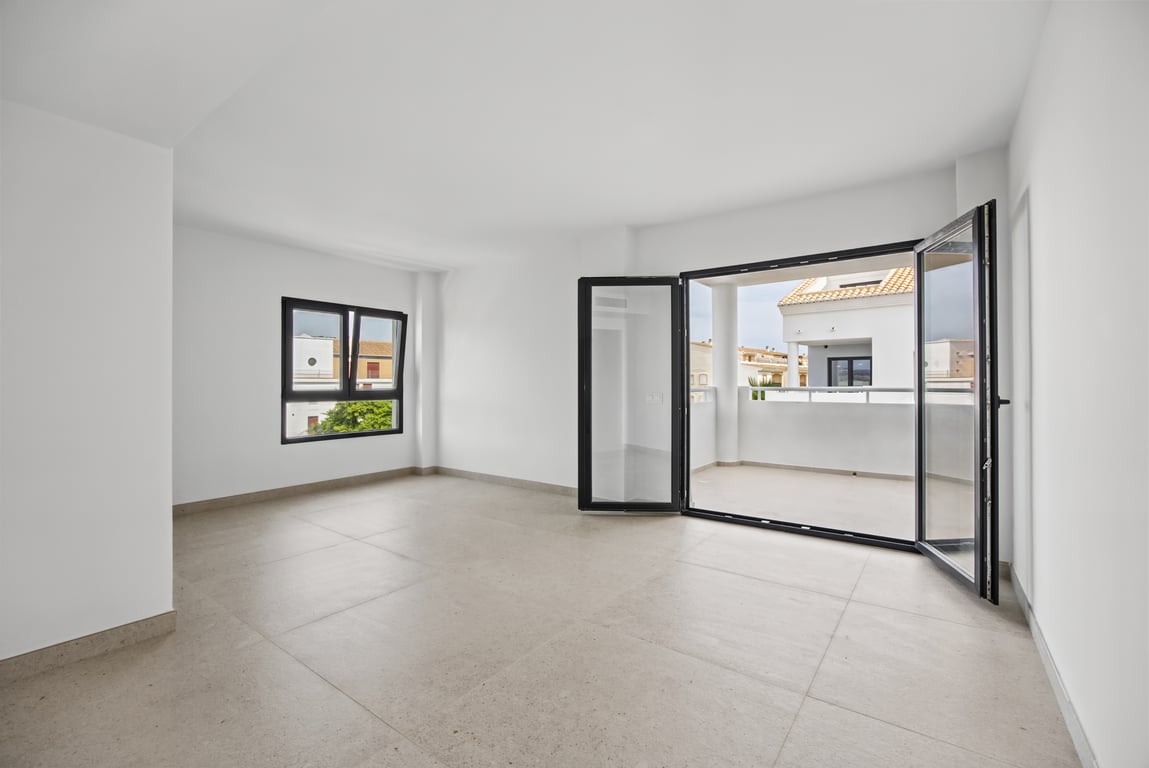 Wohnzimmer mit Zugang zur Terrasse