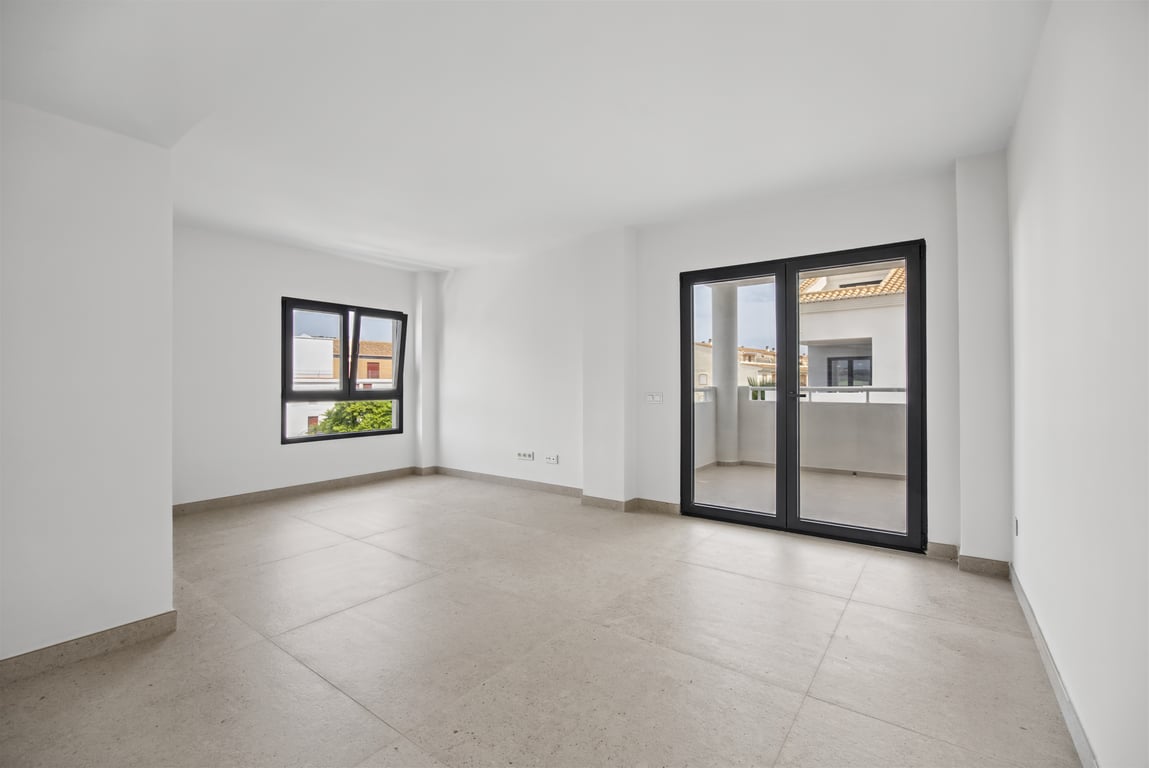 Wohnzimmer mit Zugang zur Terrasse