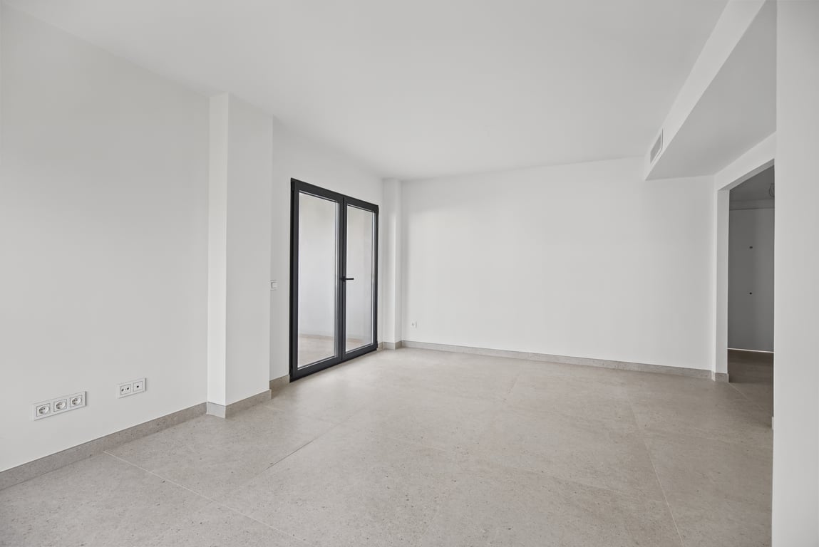 Wohnzimmer mit Zugang zur Terrasse