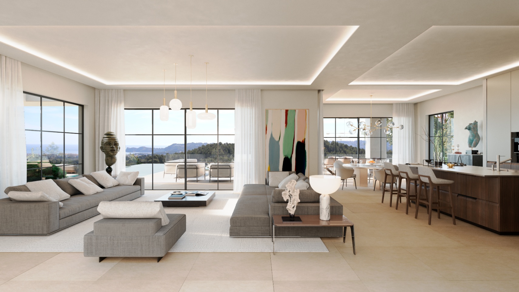 Offener Wohn- und Essbereich mit grauen Sofas, einer dunklen Kücheninsel und bodentiefen Fenstern mit weitem Blick auf das Meer und die Küstenlandschaft.