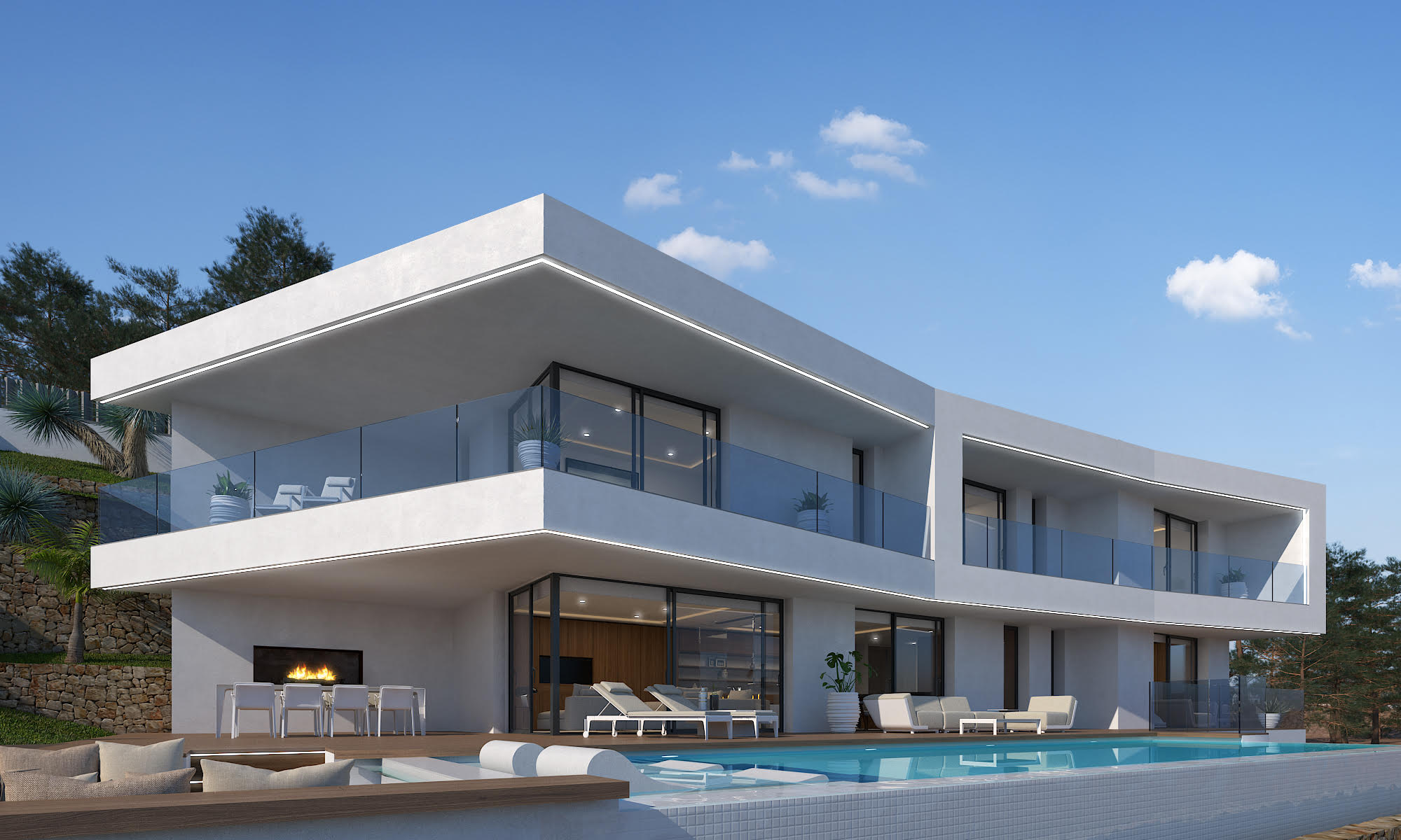 Außenansicht der Villa mit weißem Mosaikpool und Terrasse mit Kamin.
