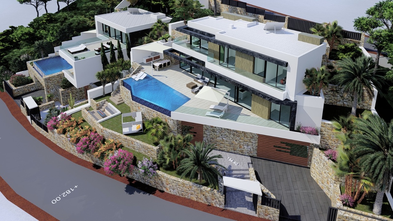 Luftaufnahme einer modernen Villa mit Infinity-Pool und Natursteinfassade.