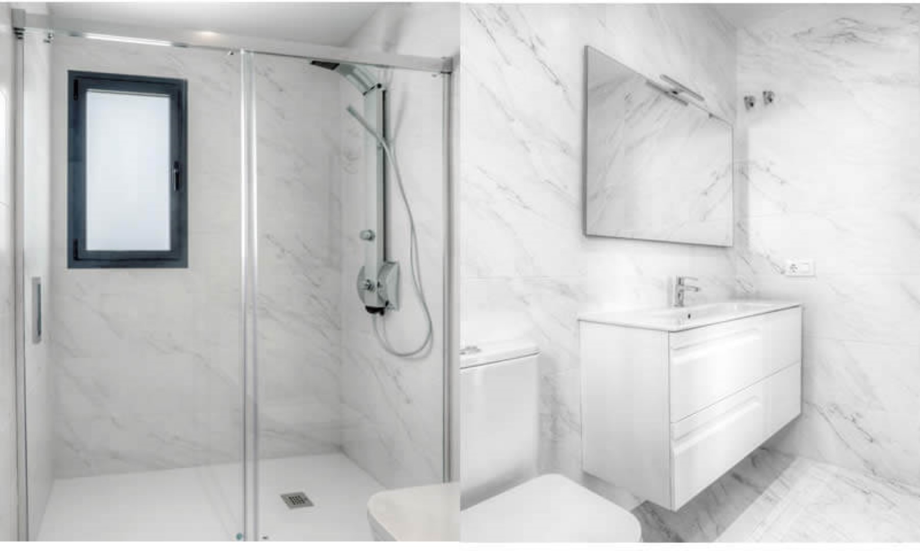 Modernes Badezimmer mit Fliesen in Marmoroptik, einer Glasdusche mit Hydromassage-Säule und einem weißen, hängenden Waschtisch mit großem Spiegel.
