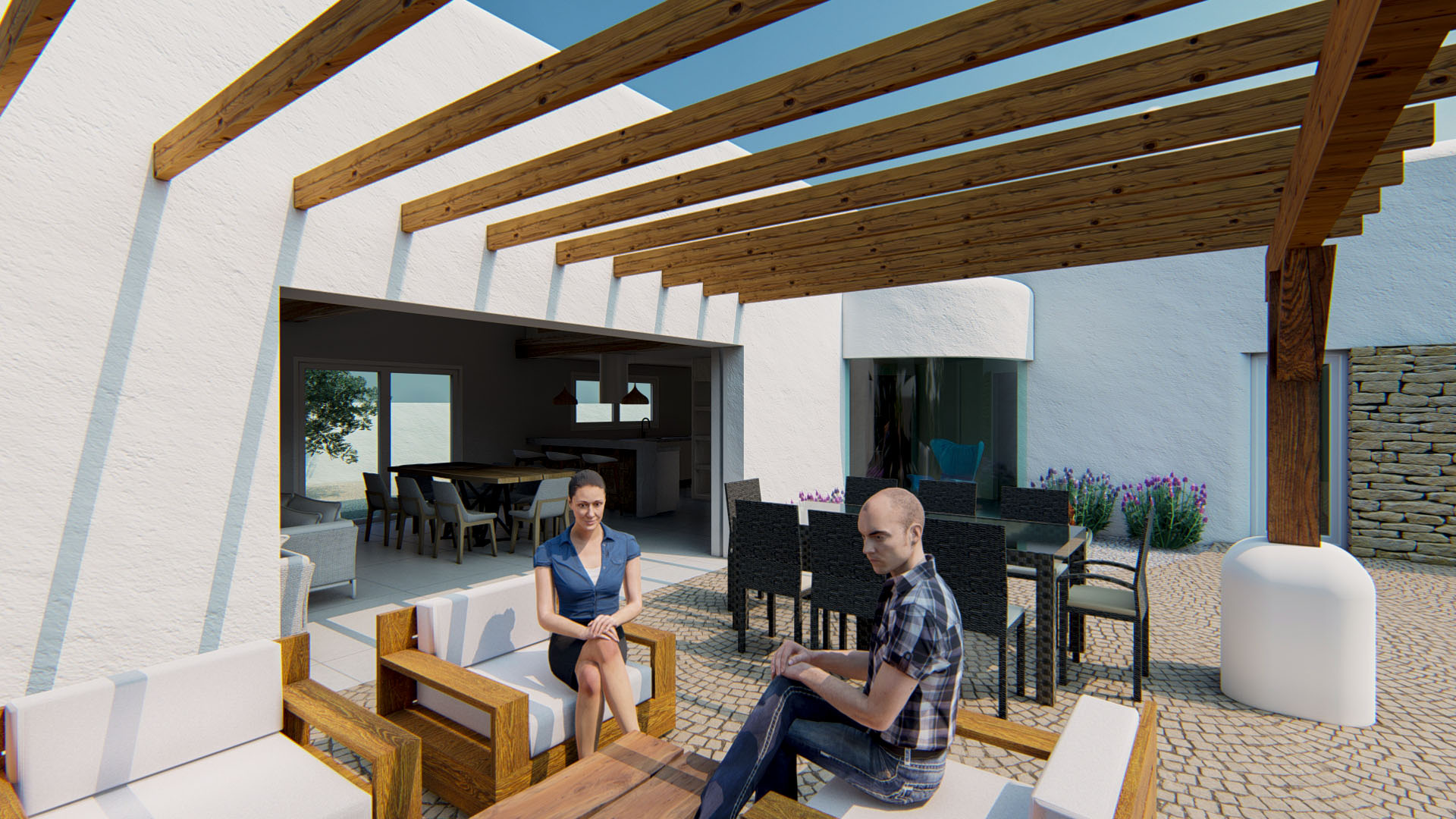 Außen-Terrasse mit einer Holzpergola, Loungebereich und Essplatz auf Kopfsteinpflaster, der durch große Schiebeelemente direkt in den Wohnbereich übergeht.