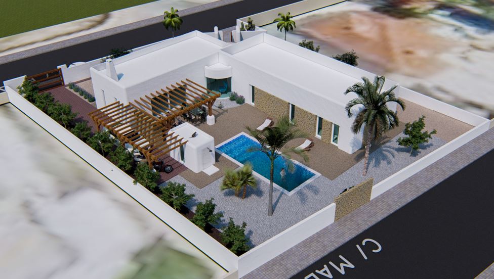 Luftaufnahme der Villa im ibizenkischen Stil mit weißen Fassaden, Steinakzenten, rechteckigem Pool und Holzpergolen auf einem privaten, ummauerten Grundstück.