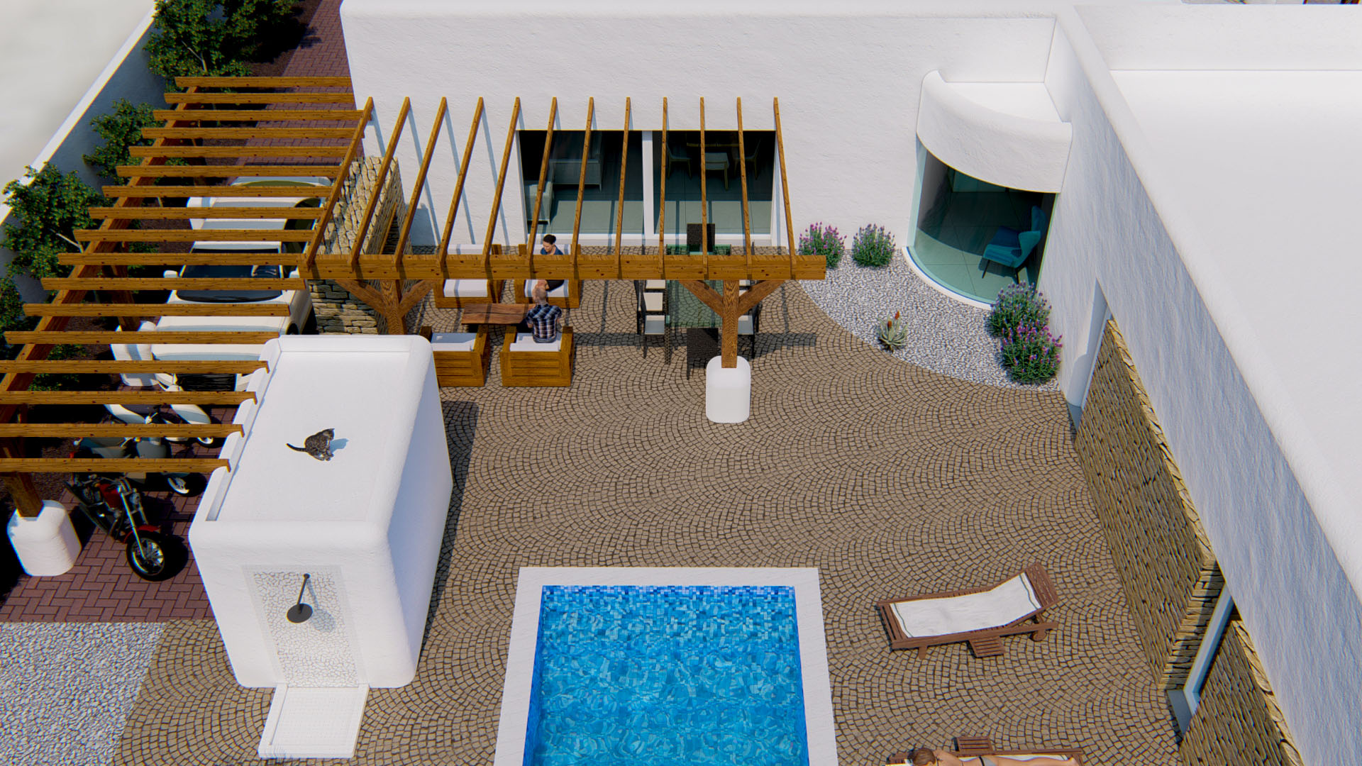 Luftaufnahme des Innenhofs mit Kopfsteinpflaster, blauem Mosaikpool, Holzpergolen für den Loungebereich und überdachtem Parkplatz für Fahrzeuge.