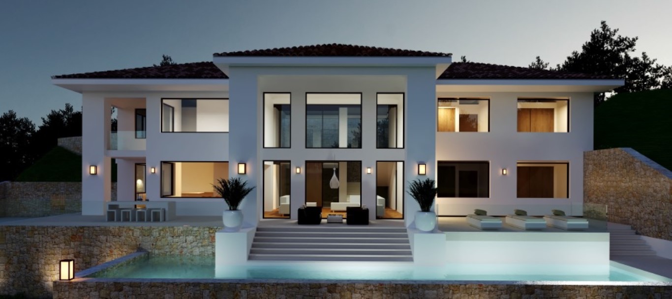 Außenfassade der Villa bei Dämmerung mit Infinity-Pool, Natursteinmauern und großzügigen Glasfronten, die ein warmes Ambiente schaffen.
