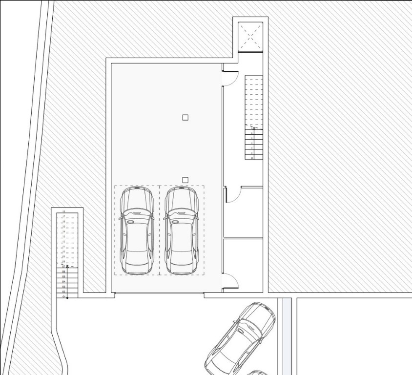 Technischer Grundriss der Garage mit Stellplätzen für mehrere Fahrzeuge, Aufzugsschacht und internem Treppenhaus zu den Wohnebenen.
