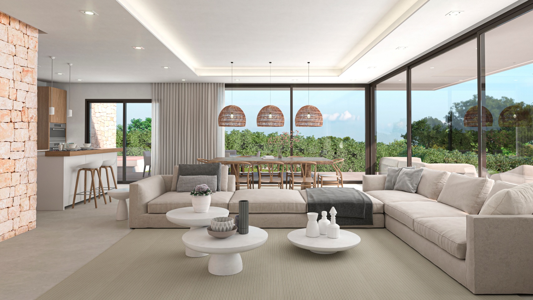 Helles Wohnzimmer mit Natursteinwand, modularen beigen Sofas und Blick in den Garten.