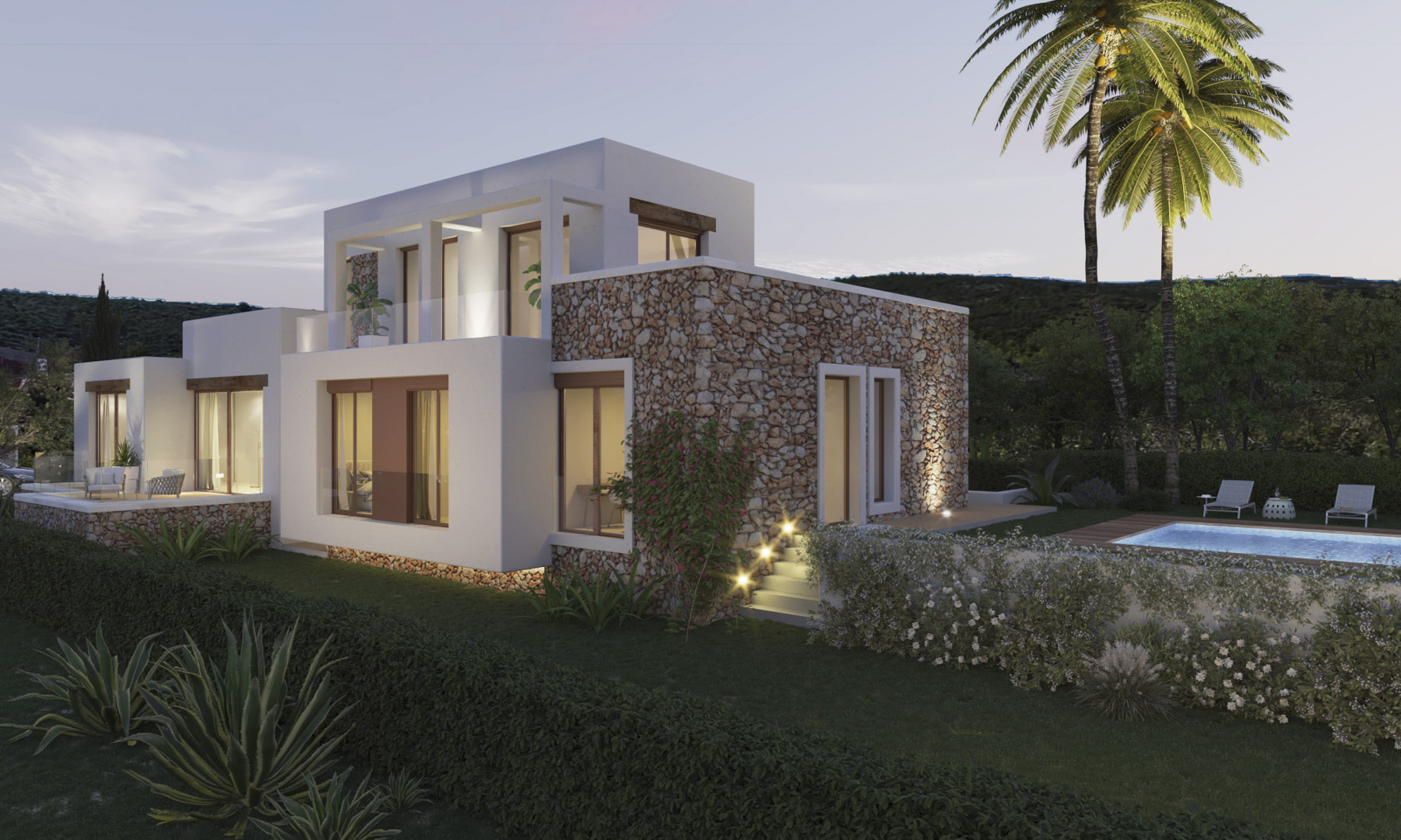 Außenansicht im ibizenkischen Stil mit Natursteinwänden, weißen Putzflächen, großen Holzfenstern und einem beleuchteten Poolbereich inmitten einer gepflegten Gartenanlage.
