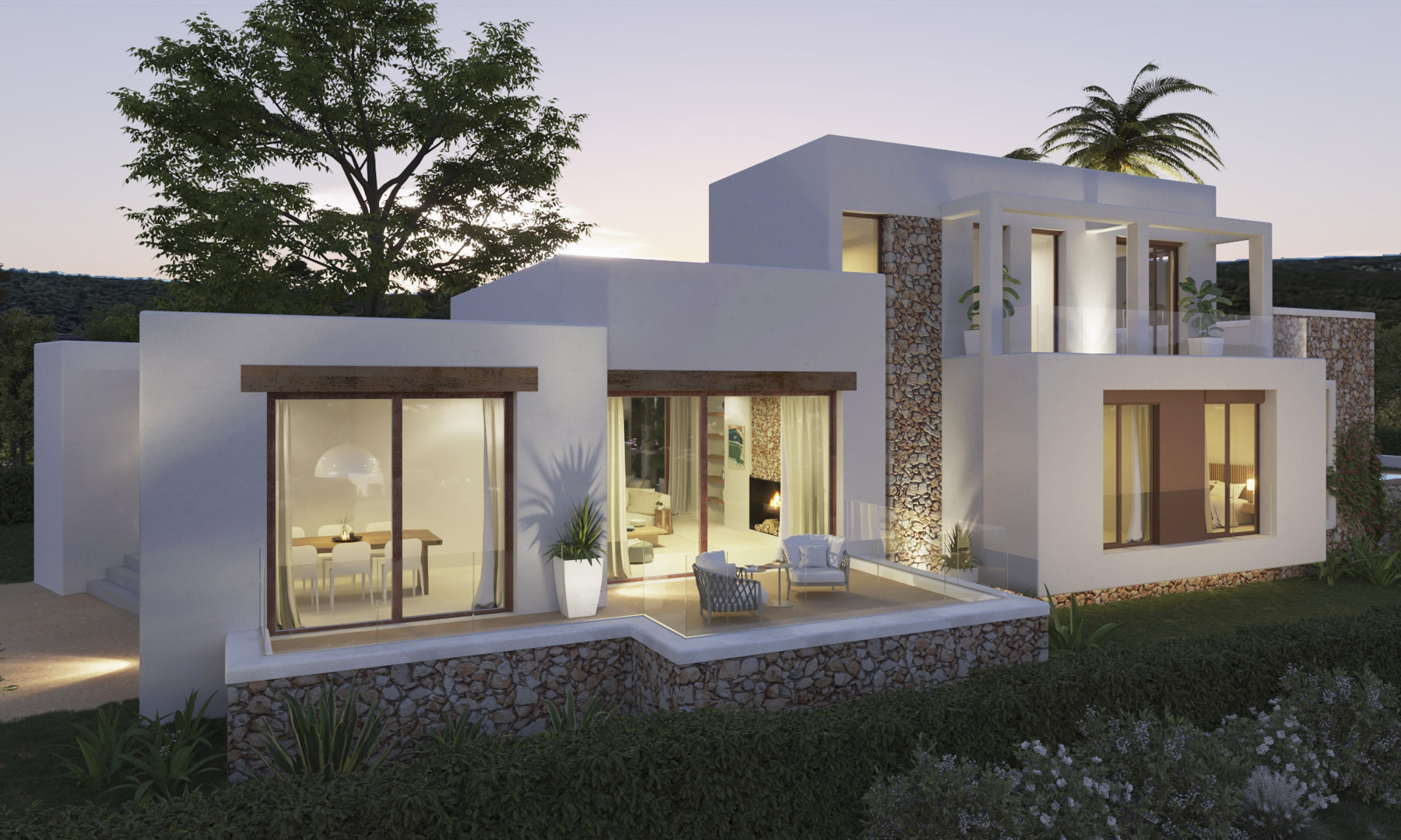 Fassade im Ibiza-Stil mit Natursteinmauerwerk und weißen Flächen. Die erhöhte Terrasse mit Glasgeländern bietet direkten Zugang zu den hell erleuchteten Wohn- und Essbereichen.