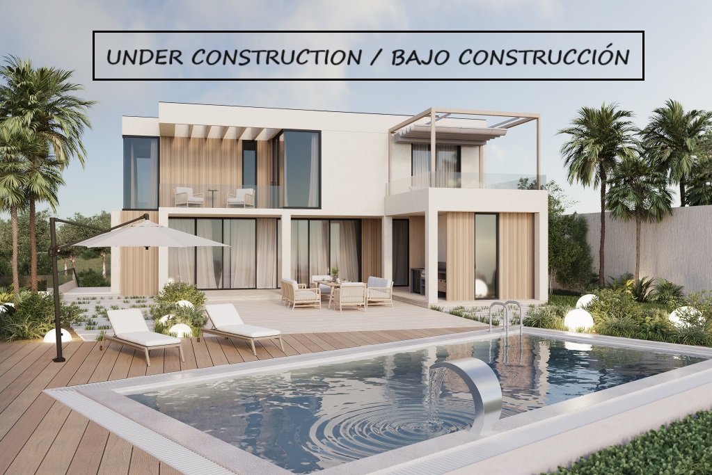 Ansicht der Villa in Calpe mit Pool, Liegestühlen und Essbereich im Freien. Modernes Design und üppige Gärten.