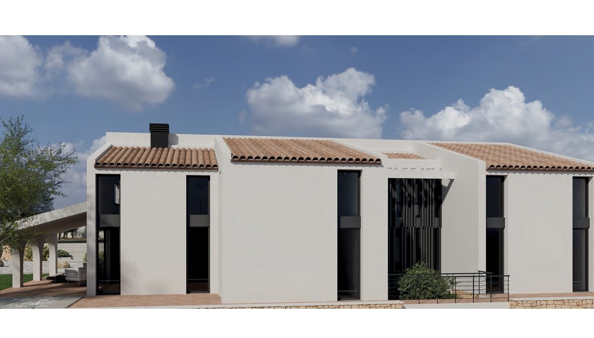 Moderne Finca-Fassade mit weißen Wänden, traditionellen Terrakotta-Ziegeldächern und hohen vertikalen Fenstern mit dunklen Rahmen.