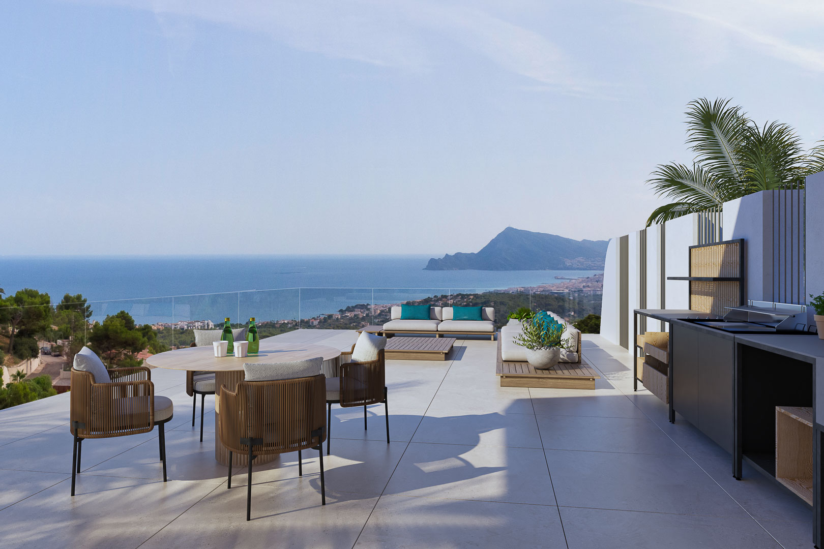 Panoramaterrasse mit Außenküche, Essbereich und Lounge. Meer- und Bergblick mit Glasgeländern und großformatigen Feinsteinzeugfliesen.