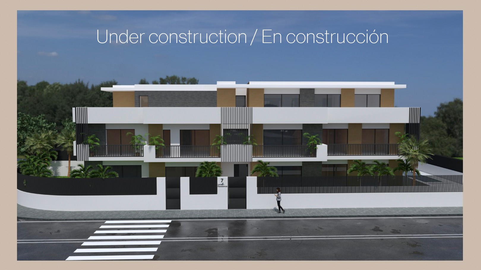 Außenansicht eines modernen Apartmenthauses mit weißer Fassade, grauen Stein- und Holzdetails sowie großzügigen Terrassen und zeitgenössischen schwarzen Metallelementen.