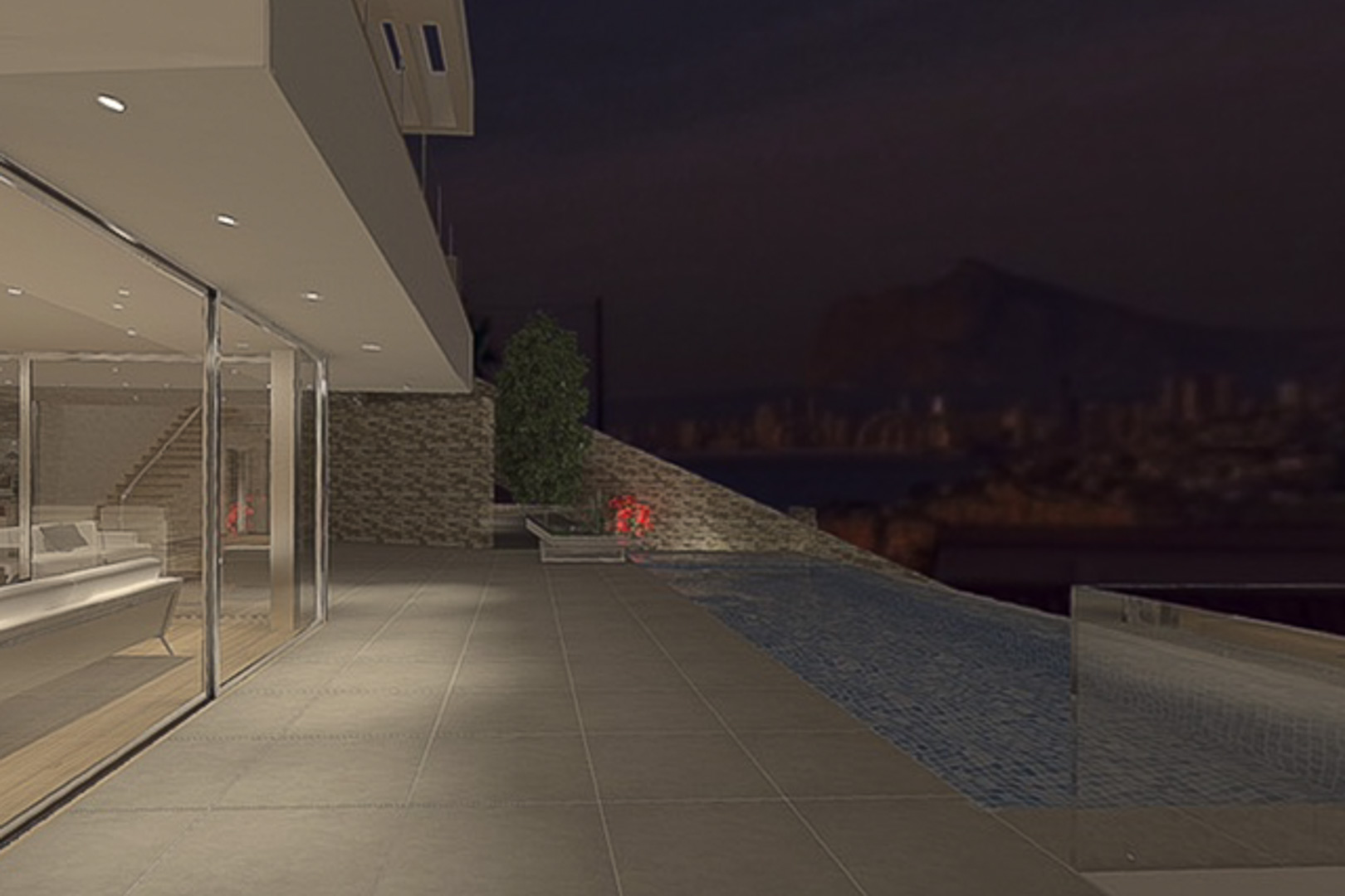 Nächtliche Terrasse mit Infinity-Pool und großformatigen Fliesen, die durch bodentiefe Glasfronten direkt mit dem modernen Wohnbereich verbunden ist.