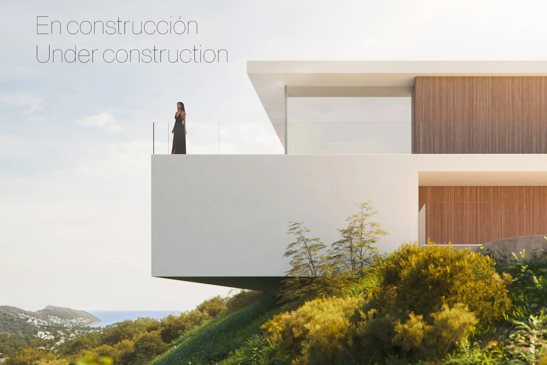 Avantgardistische Architektur mit auskragender Terrasse, Glasgeländern und Holzverkleidung, die einen weiten Blick auf das Meer und die Küste bietet.