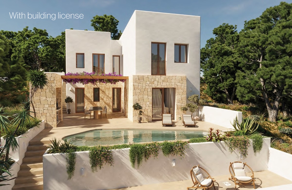 Außenansicht der Villa mit Pool, Terrasse mit Liegestühlen und Sitzecke mit Korbstühlen.