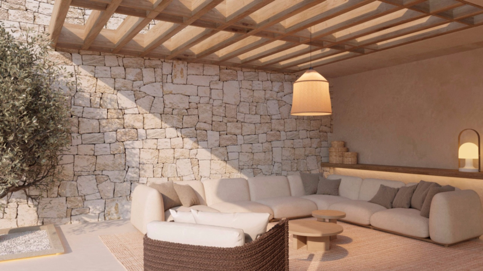 Außenlounge mit Natursteinwand, Holzpergola und großem Ecksofa. Die Hängeleuchte und moderne Möbel schaffen eine einladende Atmosphäre.