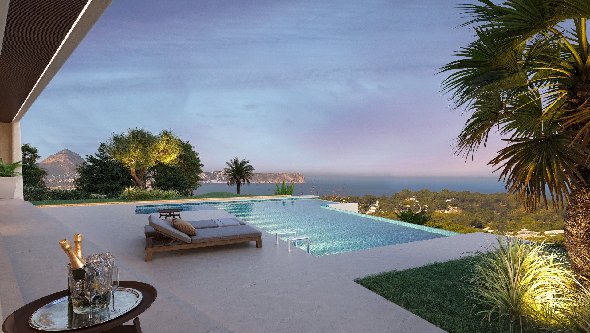 Blick auf den Infinity-Pool mit Sonnenliegen, Garten und Meer- und Bergblick bei Sonnenuntergang in Jávea.