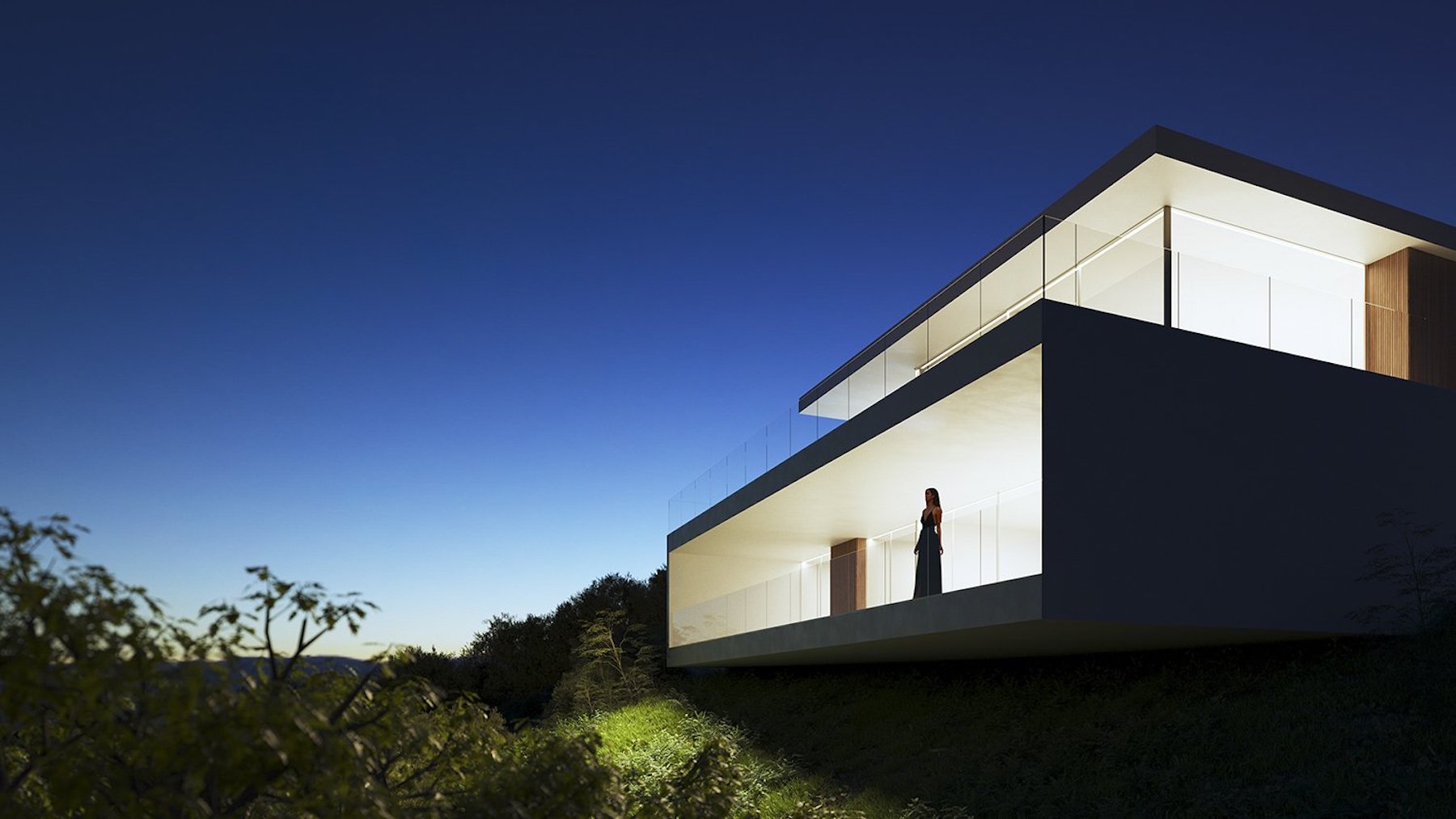 Außenansicht der Villa bei Dämmerung mit auskragenden Terrassen, Glasgeländern und warmer Innenbeleuchtung vor einem tiefblauen Himmel.