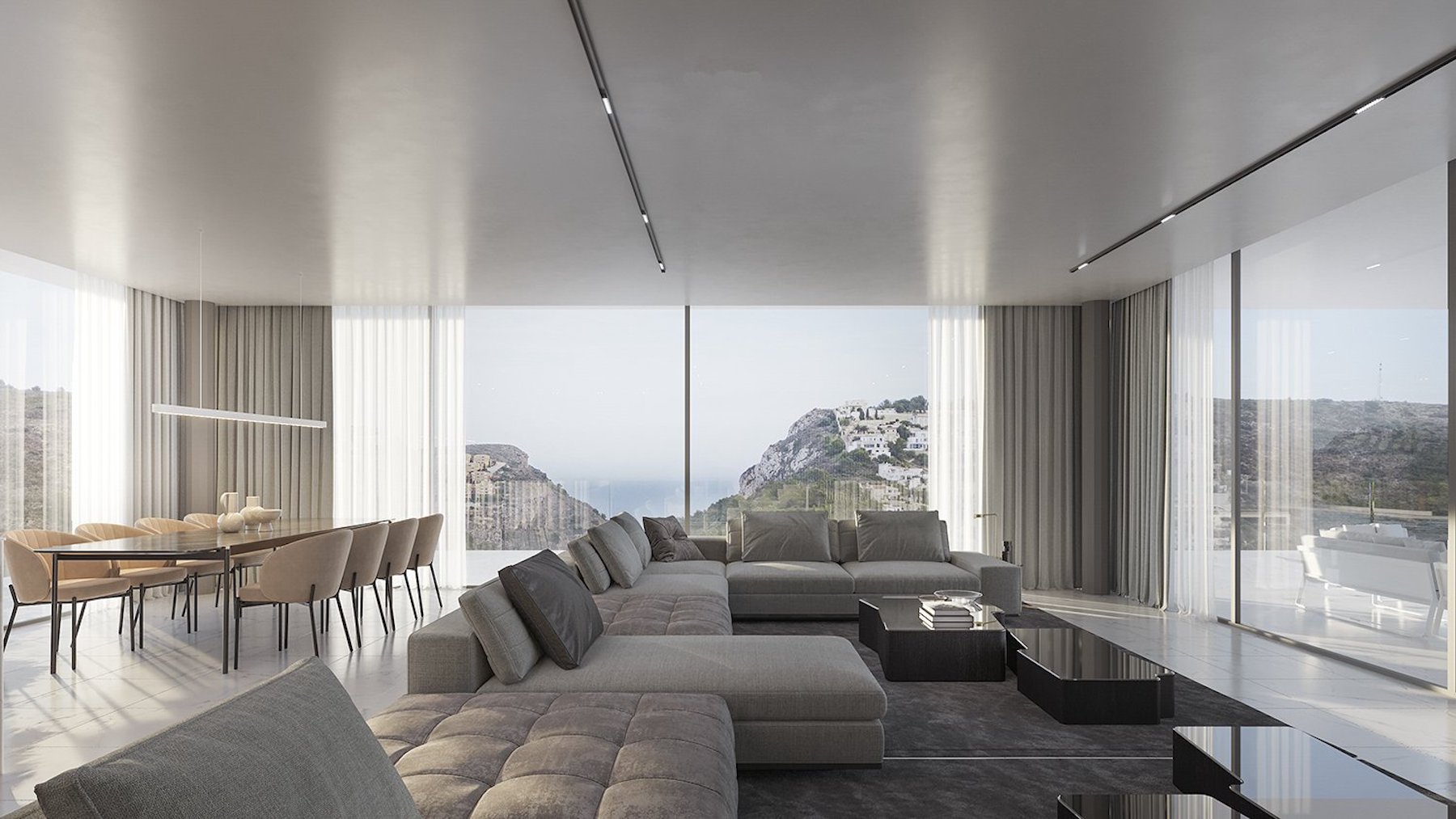 Offener Wohn- und Essbereich mit bodentiefen Glasfronten, Panoramablick auf die Küste, minimalistischen Designermöbeln und moderner Schienenbeleuchtung.
