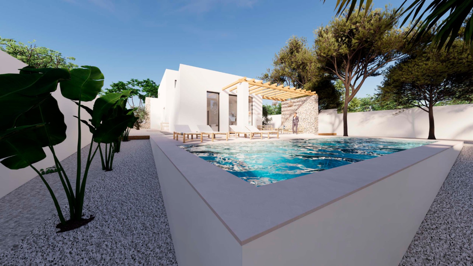 Außenansicht im ibizenkischen Stil mit erhöhtem Pool, Holzpergola vor einer Natursteinwand und Sonnenterrasse inmitten mediterraner Bepflanzung und weißem Kies.
