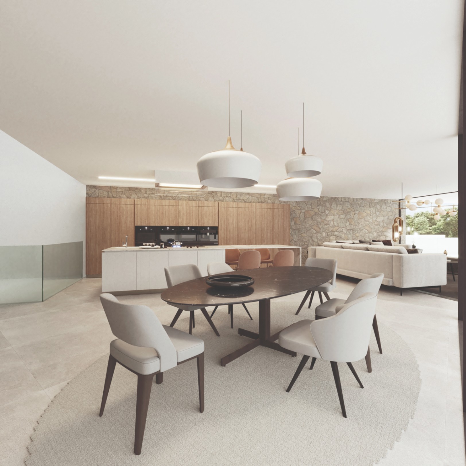 Offener Ess- und Küchenbereich mit ovalem Marmortisch, Echtholzschränken und einer Natursteinwand, die modernes Design mit mediterranen Texturen verbindet.