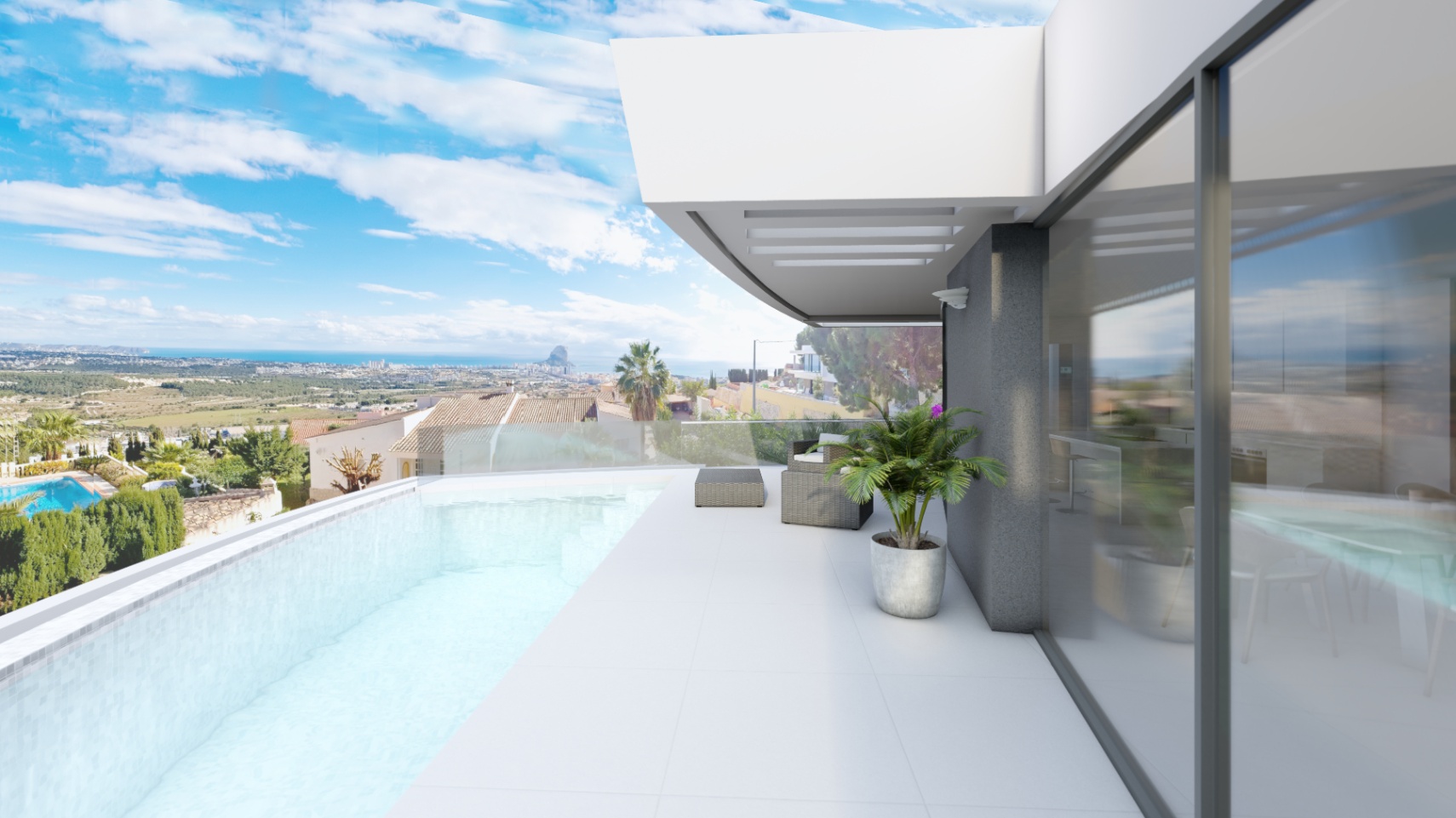 Terrasse mit Infinity-Pool, Glasgeländern und Panoramablick auf den Peñón de Ifach. Große Glasschiebetüren verbinden den weißen Fliesenboden nahtlos mit dem Wohnbereich.