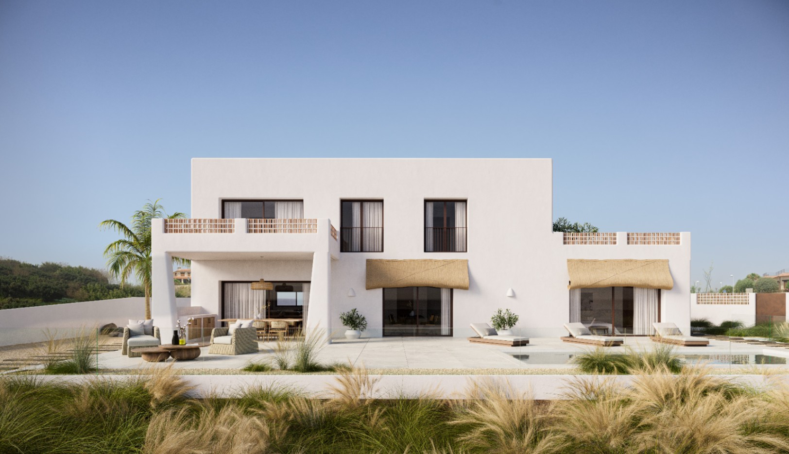 Außenansicht der weißen minimalistischen Villa mit großzügiger Steinterrasse, Lounge-Bereich, Pool und Balkonen mit dekorativen Terrakotta-Geländern.