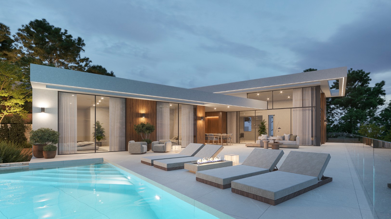 Moderne Villa bei Dämmerung mit großzügiger Terrasse, beleuchtetem Pool, Sonnenliegen mit Feuerstelle und Holzfassade mit bodentiefen Glasfronten.